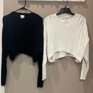Matching black and white sweaters/ size small/sold together
